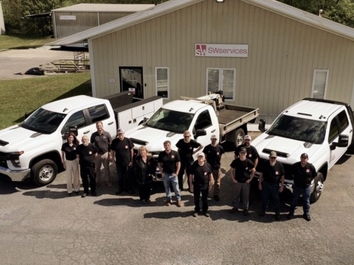The SW Services team in front of the Bristol, TN headquarters